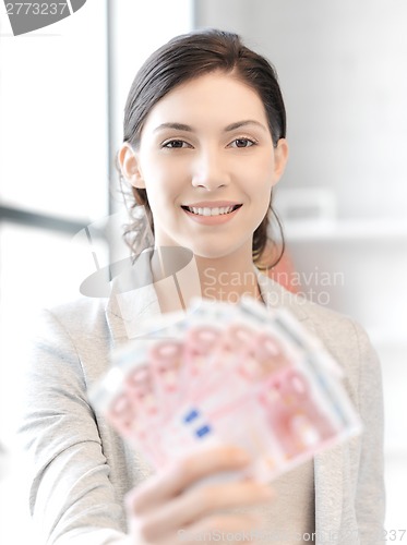 Image of lovely woman with euro cash money