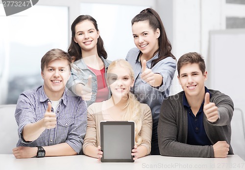 Image of smiling students with blank tablet pc screen