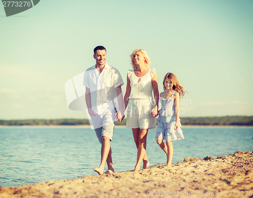 Image of happy family at the seaside