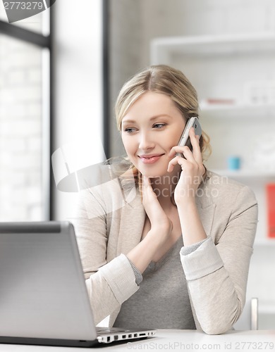 Image of businesswoman with cell phone