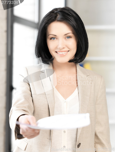 Image of happy woman with documents