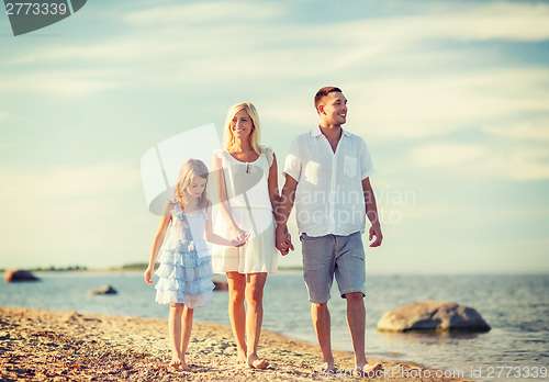 Image of happy family at the seaside