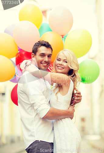 Image of couple with colorful balloons