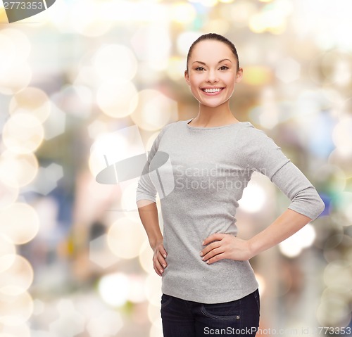 Image of smiling asian woman over white background