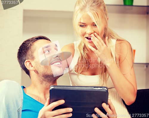 Image of happy couple at home