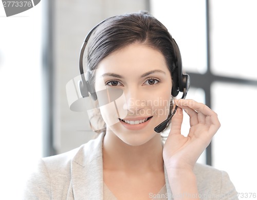 Image of friendly female helpline operator