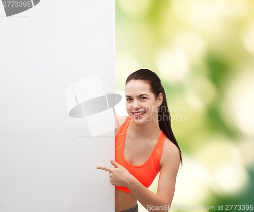 Image of teenage girl in sportswear with white board