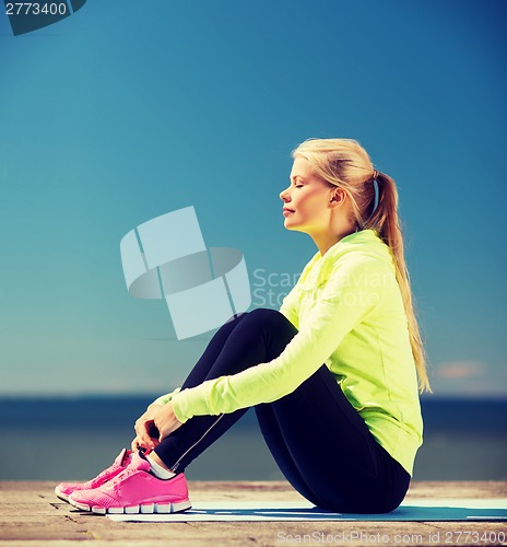 Image of woman doing sports outdoors