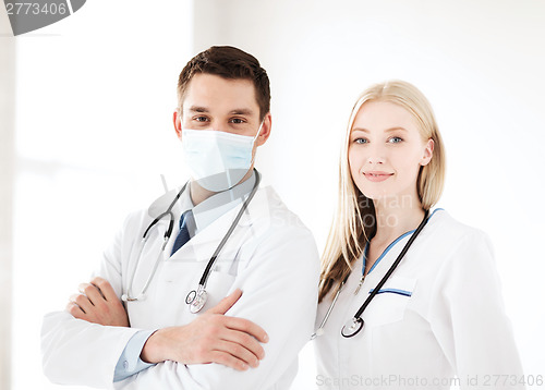 Image of two young attractive doctors