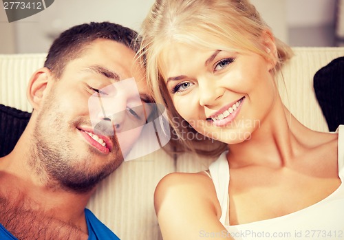 Image of happy couple at home