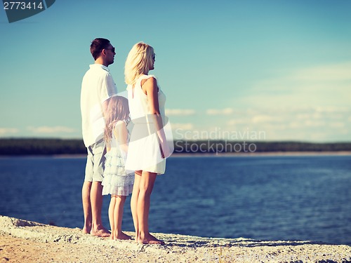 Image of happy family at the seaside