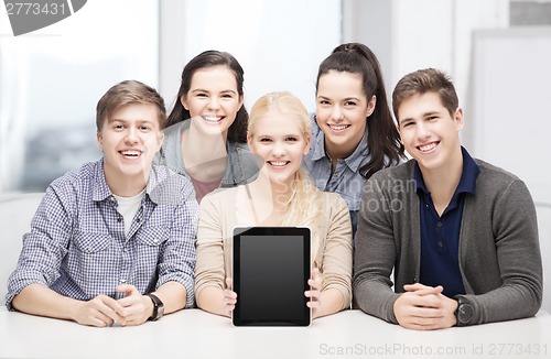 Image of smiling students with blank tablet pc screen