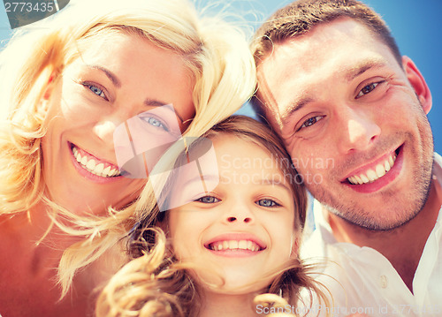 Image of happy family with blue sky