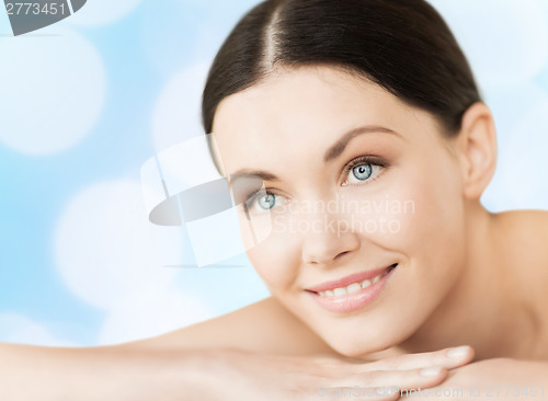 Image of smiling woman in spa salon