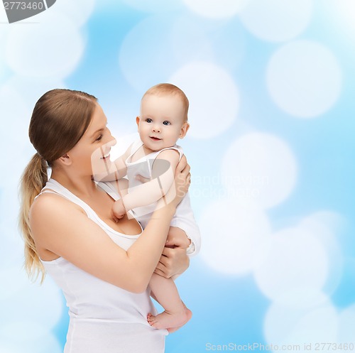 Image of happy mother with adorable baby