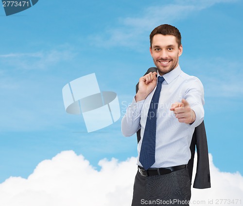 Image of handsome businessman with jacket over shoulder