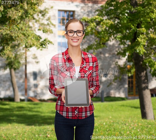Image of smiling girl with blank tablet pc screen