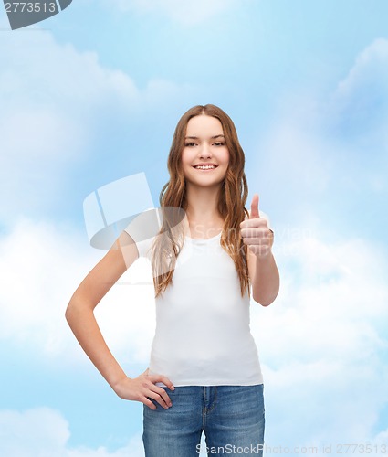 Image of smiling teenager in blank white t-shirt