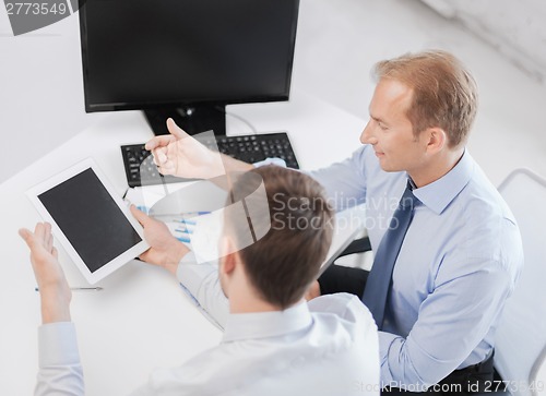 Image of businessmen with notebook and tablet pc