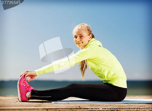 Image of woman doing sports outdoors