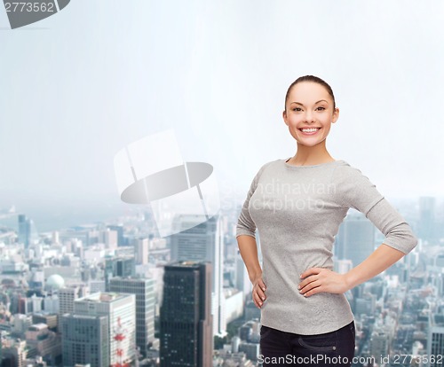 Image of smiling asian woman over white background