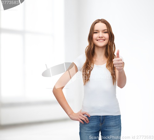 Image of smiling teenager in blank white t-shirt