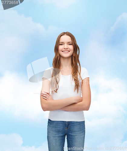 Image of smiling teenager in blank white t-shirt