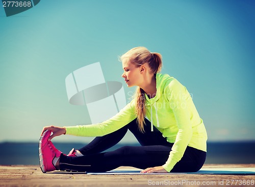 Image of woman doing sports outdoors