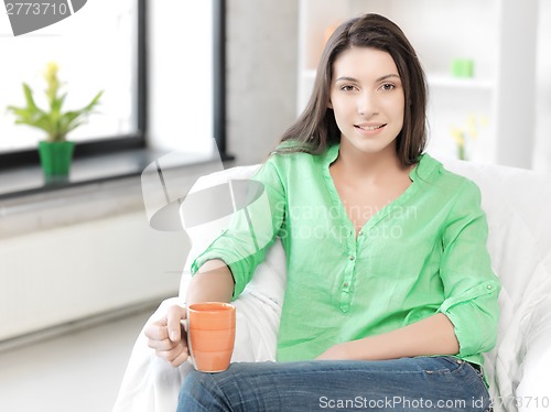 Image of lovely woman with mug