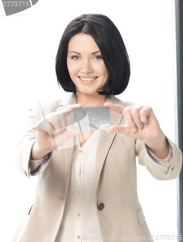 Image of happy woman with credit card