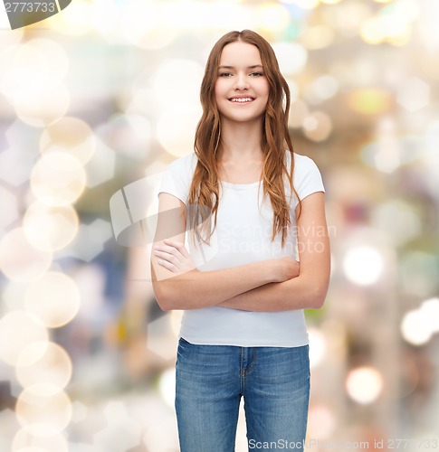 Image of smiling teenager in blank white t-shirt