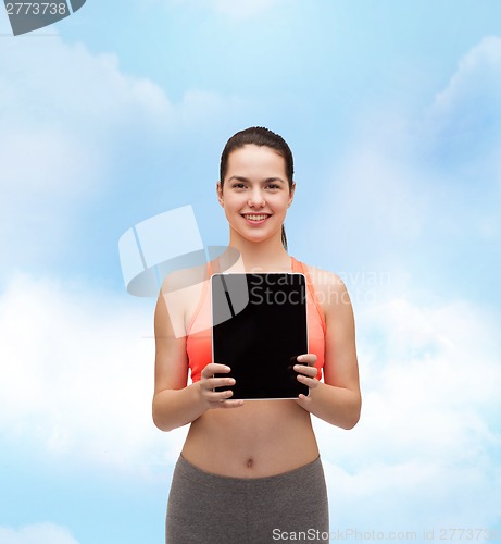 Image of sporty woman with tablet pc blank screen