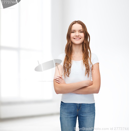 Image of smiling teenager in blank white t-shirt
