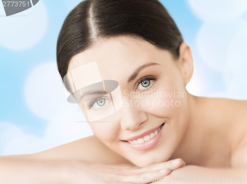 Image of smiling woman in spa salon