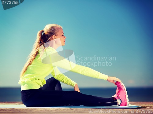Image of woman doing sports outdoors