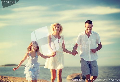 Image of happy family at the seaside