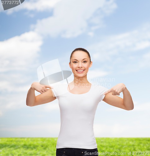 Image of smiling woman in blank white t-shirt