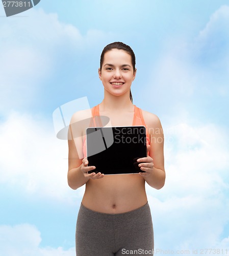 Image of sporty woman with tablet pc blank screen