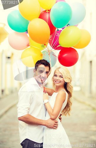 Image of couple with colorful balloons