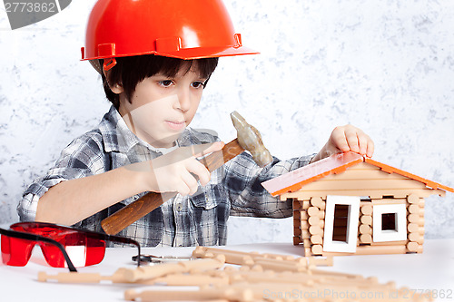 Image of boy built a new house