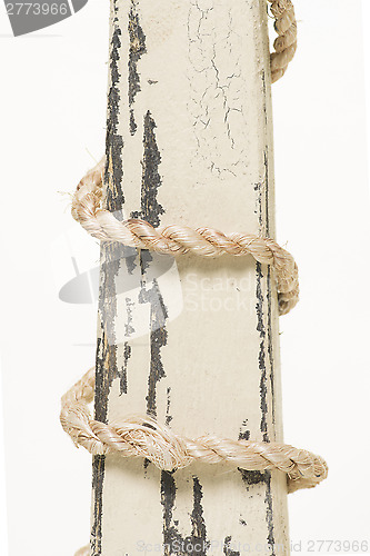 Image of wrapped rope on wood