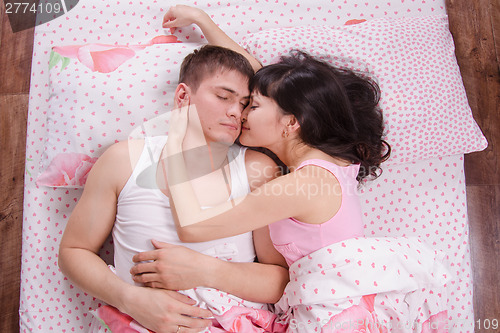 Image of Loving each other couple sleeping in bed