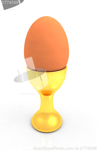 Image of Easter egg on gold egg cups