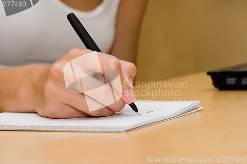 Image of Woman writing