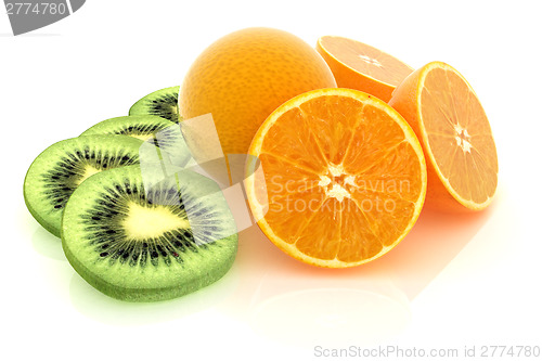 Image of slices of kiwi, orange and half orange