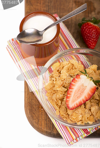 Image of breakfast with milk, muesli and fruit