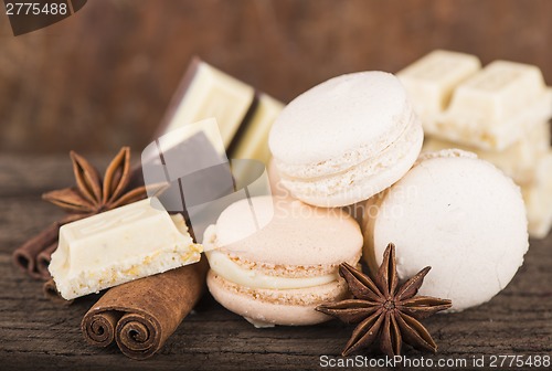 Image of Chocolate macaroons with pieces of white and black chocolate