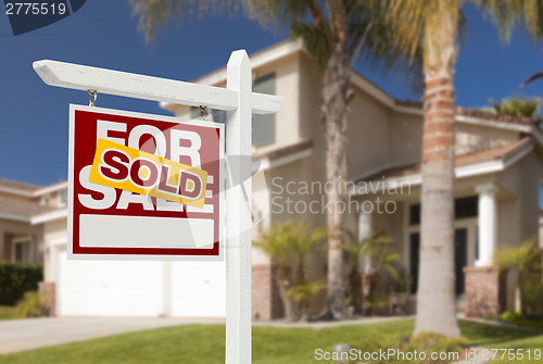 Image of Sold Home For Sale Sign in Front of New House