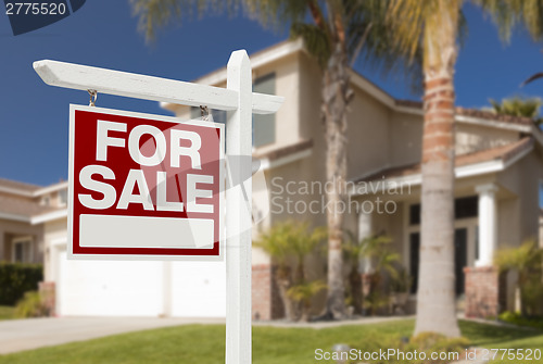 Image of Home For Sale Sign in Front of New House