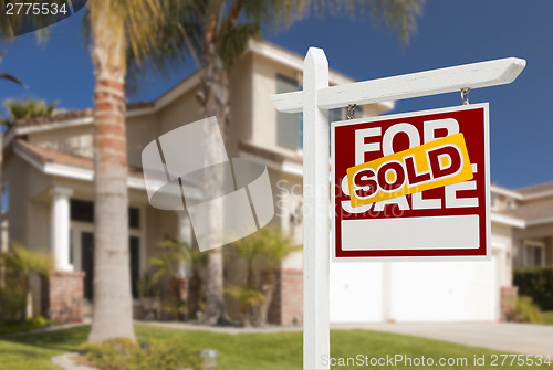 Image of Sold Home For Sale Sign in Front of New House